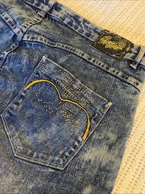 Apple Bottoms denim shorts feature a distinct acid wash embellished Size 18